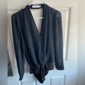 Black sheer deep V bodysuit by JustFab